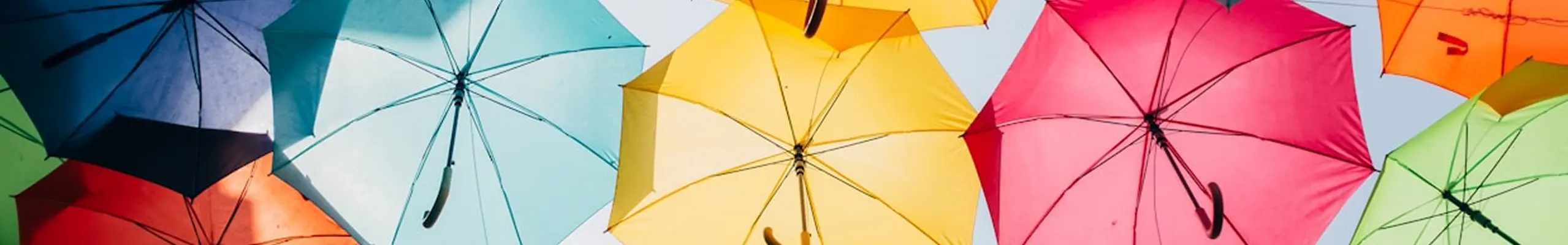 Branchen Versicherungen Banner Regenschirme